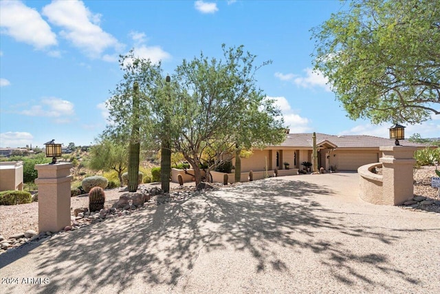 view of front of property with a garage