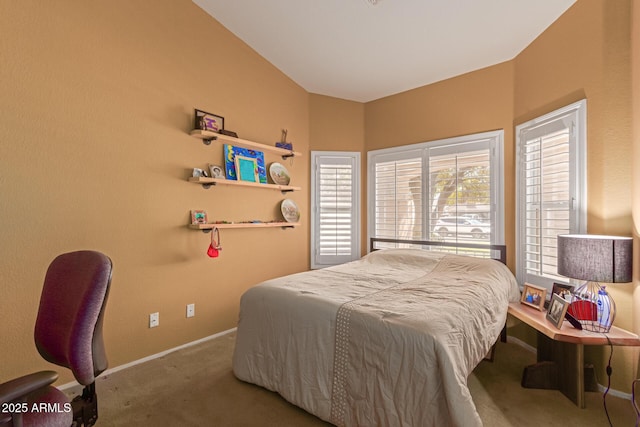 carpeted bedroom with baseboards