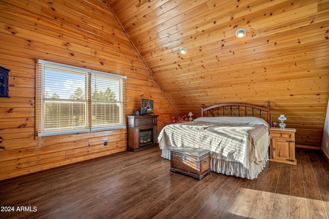 bedroom featuring lofted ceiling, wood walls, wood ceiling, and dark hardwood / wood-style floors