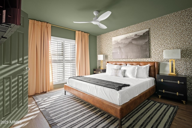 8001 E Voltaire Ave, Scottsdale, AZ 85260 - bedroom featuring wallpapered walls, wood finished floors, and ceiling fan