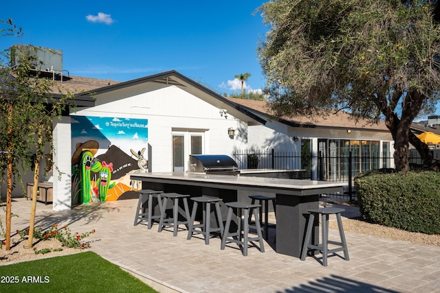 8001 E Voltaire Ave, Scottsdale, AZ 85260 - view of patio with exterior kitchen