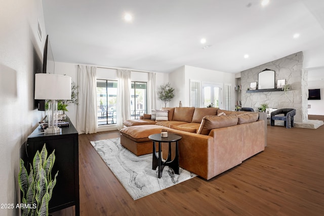 8001 E Voltaire Ave, Scottsdale, AZ 85260 - living area featuring plenty of natural light, wood finished floors, a fireplace, and recessed lighting