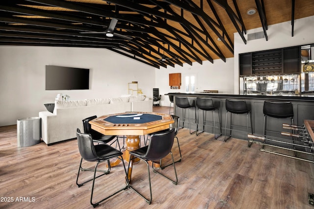 8001 E Voltaire Ave, Scottsdale, AZ 85260 - dining room featuring wood finished floors and a community bar