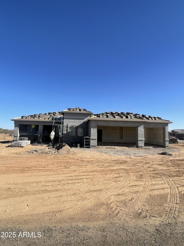 property under construction featuring an outdoor structure