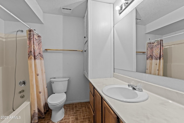 full bathroom featuring vanity, shower / bath combination with curtain, a textured ceiling, and toilet