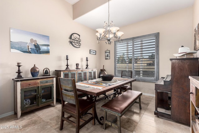 dining room featuring a notable chandelier