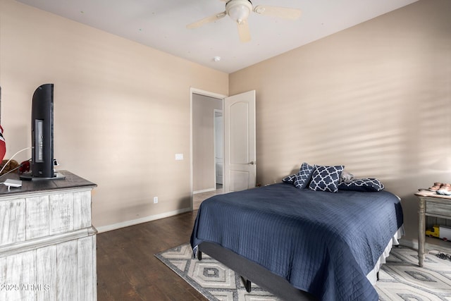 bedroom featuring ceiling fan and dark hardwood / wood-style flooring