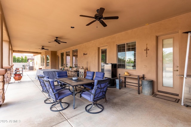 view of patio featuring ceiling fan