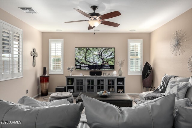 living room featuring ceiling fan