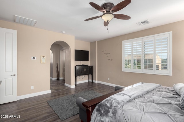 bedroom featuring ceiling fan and dark hardwood / wood-style floors