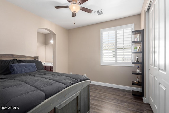 bedroom featuring ceiling fan and dark hardwood / wood-style floors