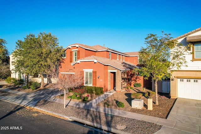 view of front of property with a garage