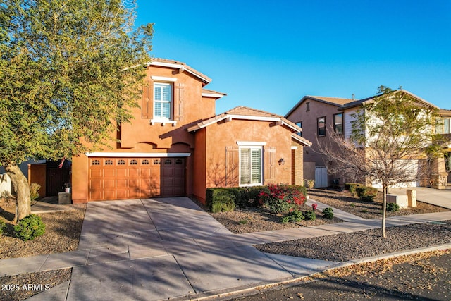 view of front of home with a garage