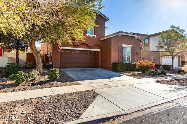 front of property with a garage