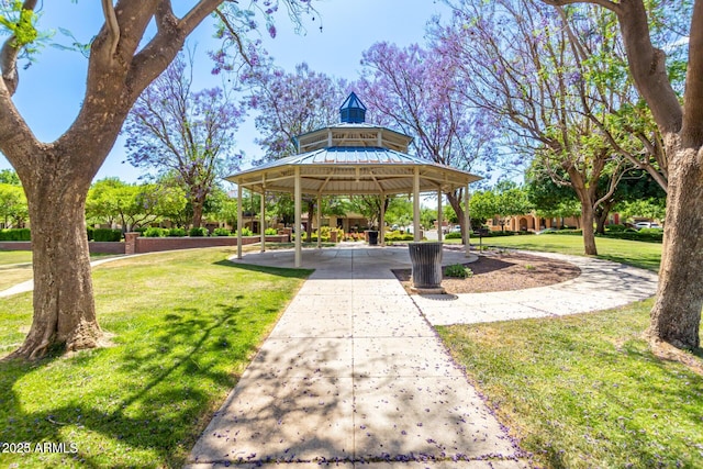 view of home's community with a gazebo and a lawn