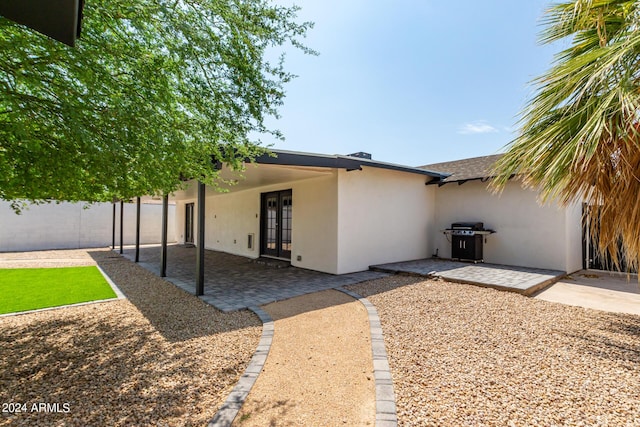 view of front of home with a patio area