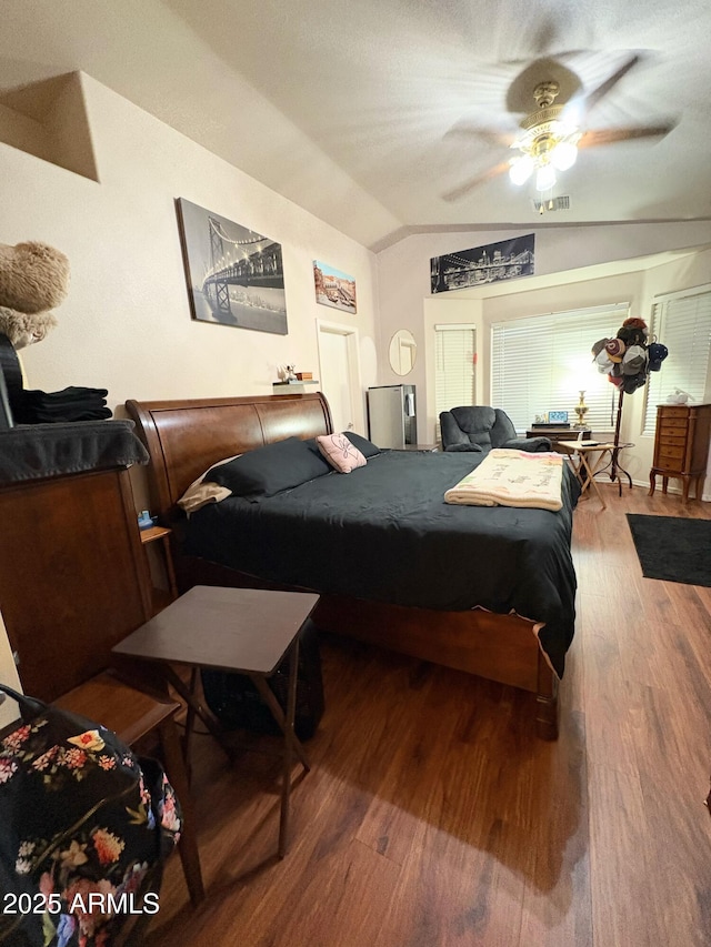 3418 W Maldonado Rd, Phoenix, AZ 85041 - bedroom with lofted ceiling, wood finished floors, and a ceiling fan