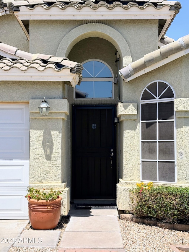 3418 W Maldonado Rd, Phoenix, AZ 85041 - property entrance featuring stucco siding and a garage