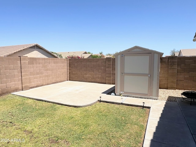 3418 W Maldonado Rd, Phoenix, AZ 85041 - view of yard with an outbuilding, a patio, and a storage unit