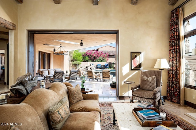 living room featuring a chandelier