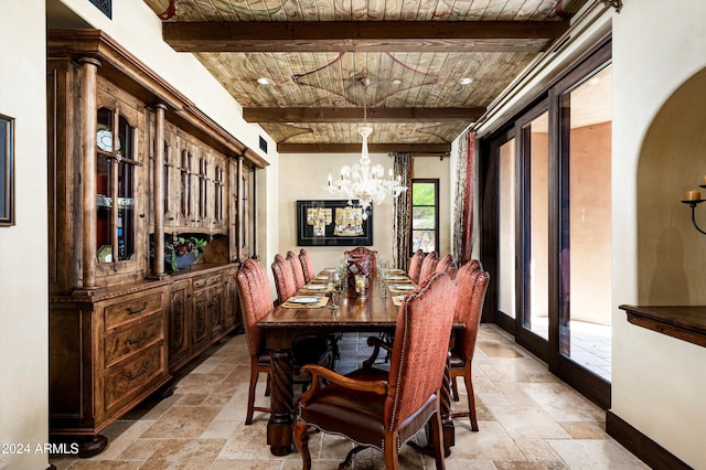 dining room featuring beam ceiling and an inviting chandelier