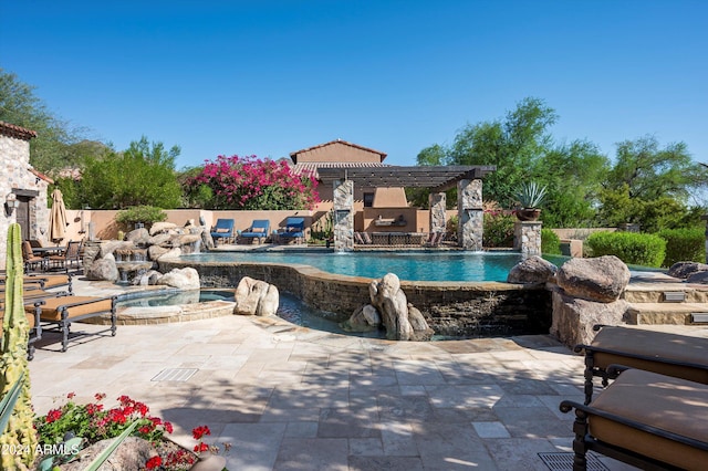 view of swimming pool featuring an in ground hot tub, a patio area, pool water feature, and a pergola