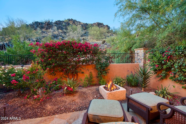 view of patio featuring a fire pit