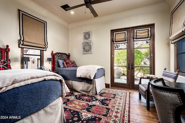 bedroom featuring french doors, ceiling fan, wood-type flooring, and access to exterior