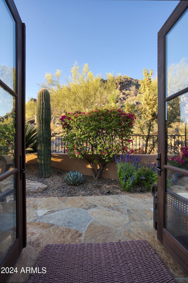 view of patio featuring fence