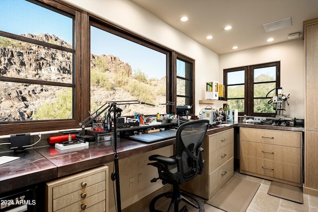 office featuring recessed lighting and a healthy amount of sunlight