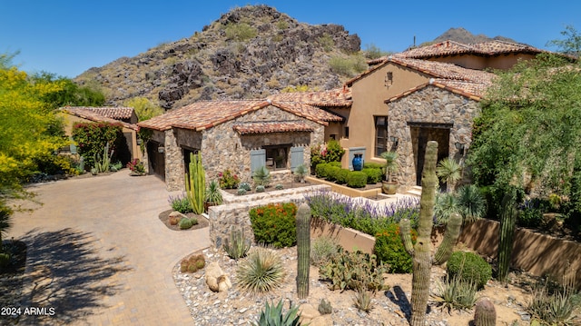 mediterranean / spanish-style home featuring a mountain view