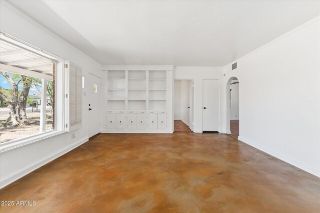 1238 E Cambridge Ave, Phoenix, AZ 85006 - spare room featuring concrete floors and arched walkways