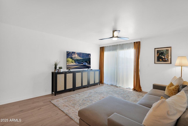 4600 N 68th St Unit 370, Scottsdale, AZ 85251 - living area with wood finished floors, baseboards, and ceiling fan