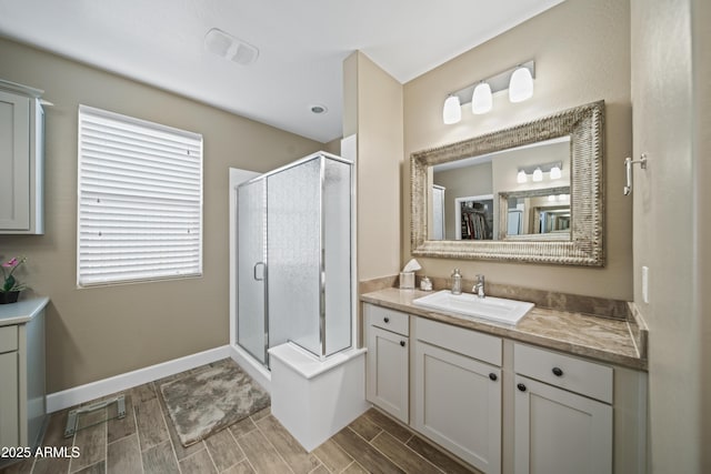 bathroom featuring vanity and walk in shower