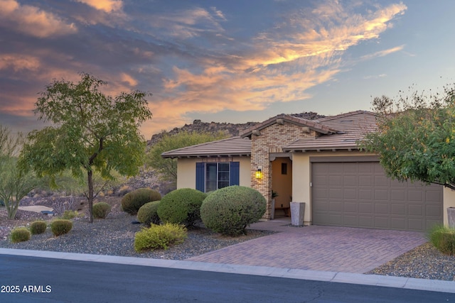 view of front of home with a garage