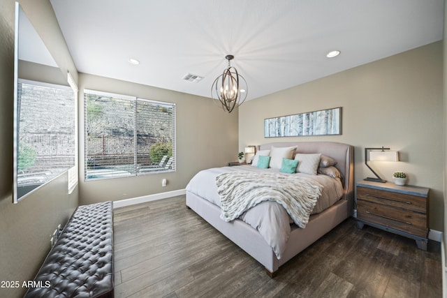 bedroom with dark wood-type flooring