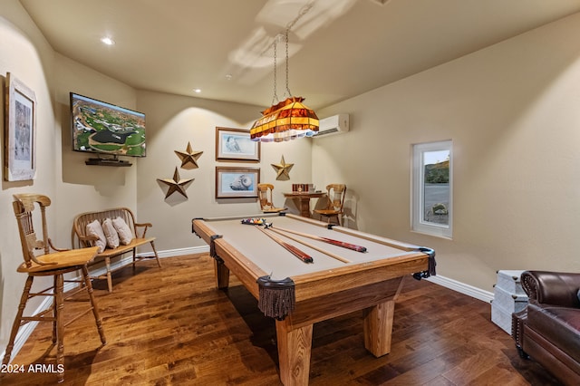 game room with billiards, dark wood-type flooring, and a wall mounted air conditioner