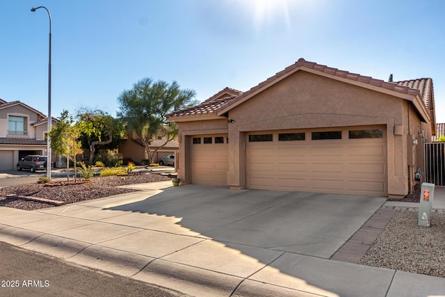 view of front of property with a garage