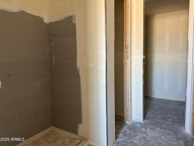 bathroom with concrete flooring