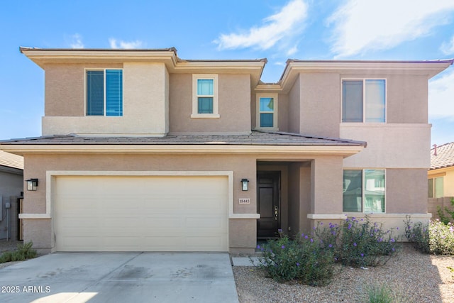 view of front of property featuring a garage