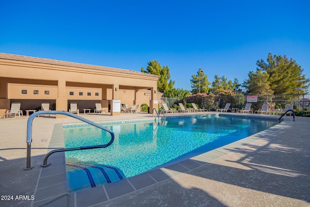 view of pool featuring a patio