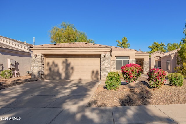 view of front of home with a garage