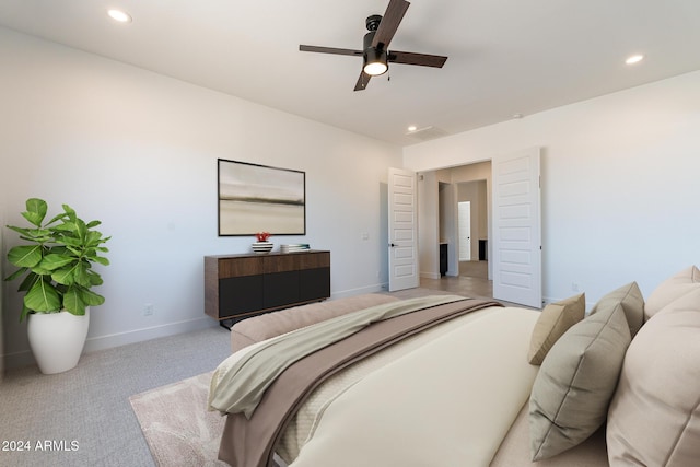 carpeted bedroom with ceiling fan