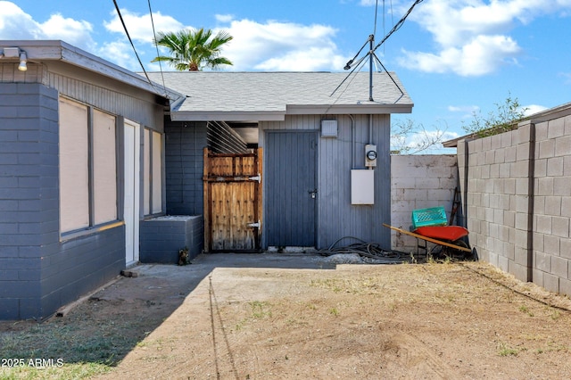 view of outdoor structure with fence