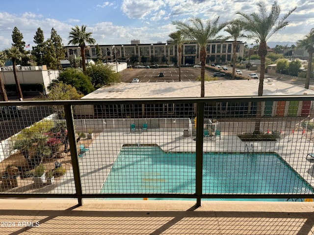 view of swimming pool featuring a patio