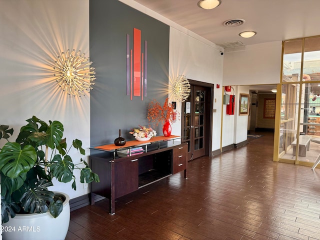 hall with dark wood-type flooring