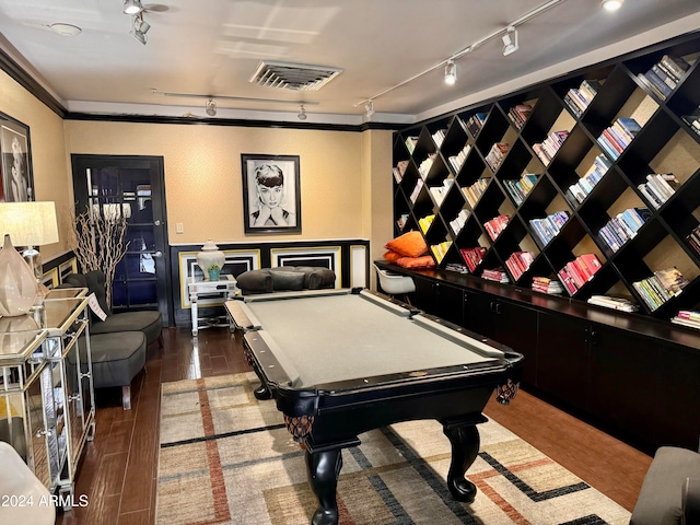 rec room with ornamental molding, pool table, track lighting, and dark hardwood / wood-style floors