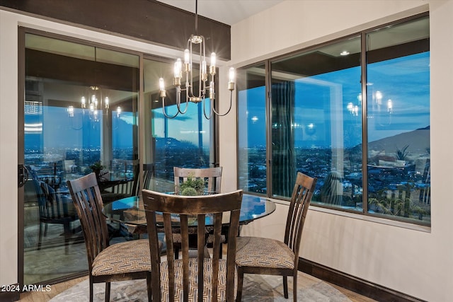 dining room featuring a notable chandelier