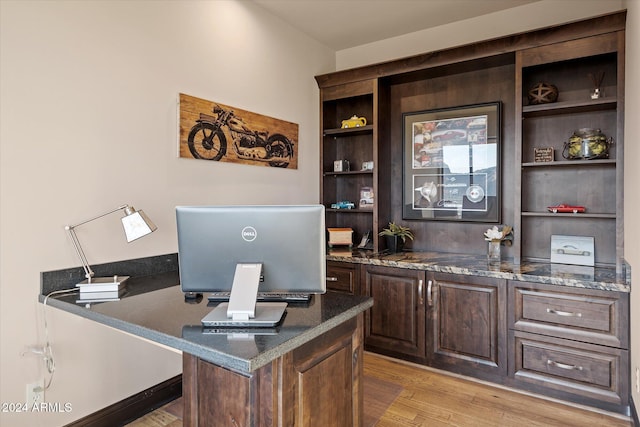 home office featuring light hardwood / wood-style floors