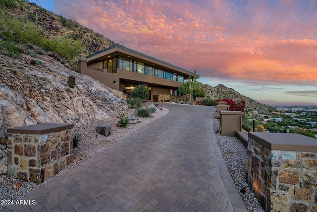 view of front of house with a mountain view